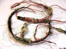 حرز ملفوف بشعر المسحور او المسحورة